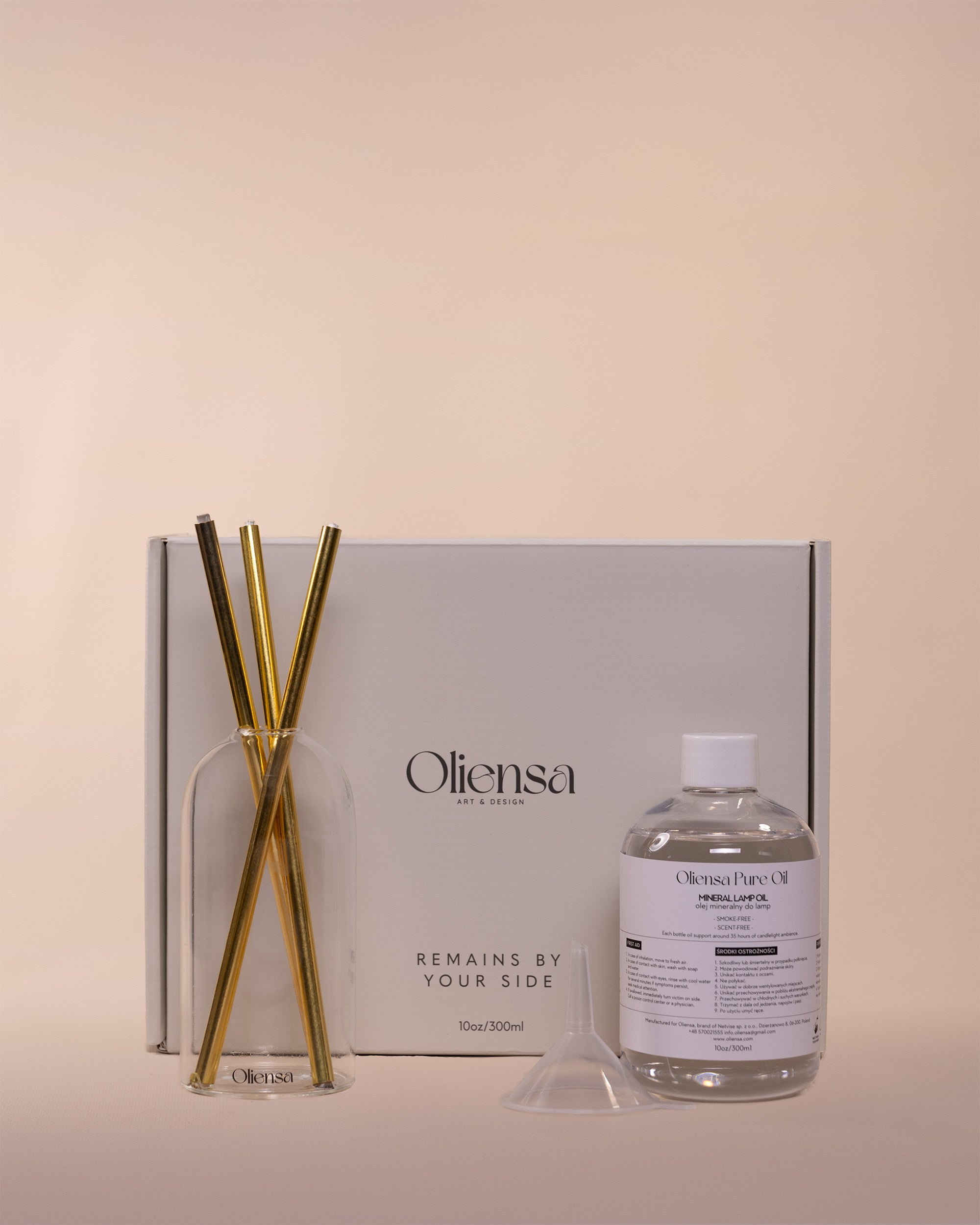 Packshot Świeca eternal crystal gold - zawartość zestawu obok pudełka