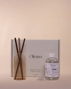 Packshot Świeca eternal copper sand - zawartość zestawu obok pudełka